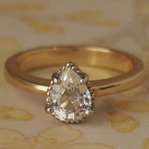 Titaness - 18YG & 18WG 1.06ct White Pear Sapphire Claw Set Solitaire Ring with Beaded Edge Size M