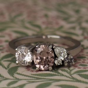 Athena - PLT 1.20ct Pink Oval Spinel Asymmetric Multistone Ring with Sapphires & .18ct TDW Pear & Round Diamonds
