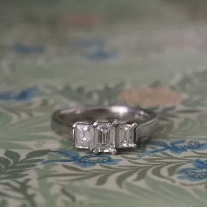 Crocus - PLT .40ct E VVS1 Emerald Cut Diamond Three Stone Ring with .43ct TDW F-G VS2 Diamond Sides Size M