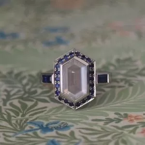 Moondance - PLT 2.24ct Grey Hexagonal Moonstone Cluster Ring Flanked with Blue Baguette Sapphires and Grain Set Blue Sapphire Frame Size M