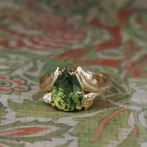 Eden - 9YG 5.83ct Green Pear Zircon with .06ct Diamond and hand Engraved Leaf Design Ring