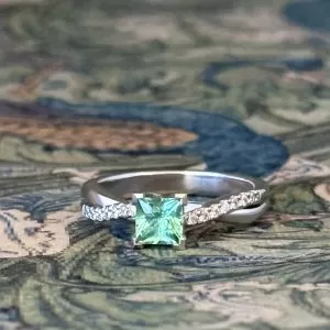 Panacea - PLT .59ct Mint Green Princess Tourmaline 4 Claw Set Multistone Ring with .12ct TDW Diamond Twisted Scollop Claw Set Band