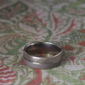 Titanium, 7mm low half round with a fine centre groove half polished and half brushed finish Q 1/2 *