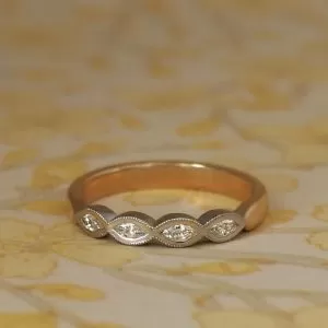 Margo - 18WG & 18YG .16ct TDW D-F VS Marquise Diamond Rub Set Band